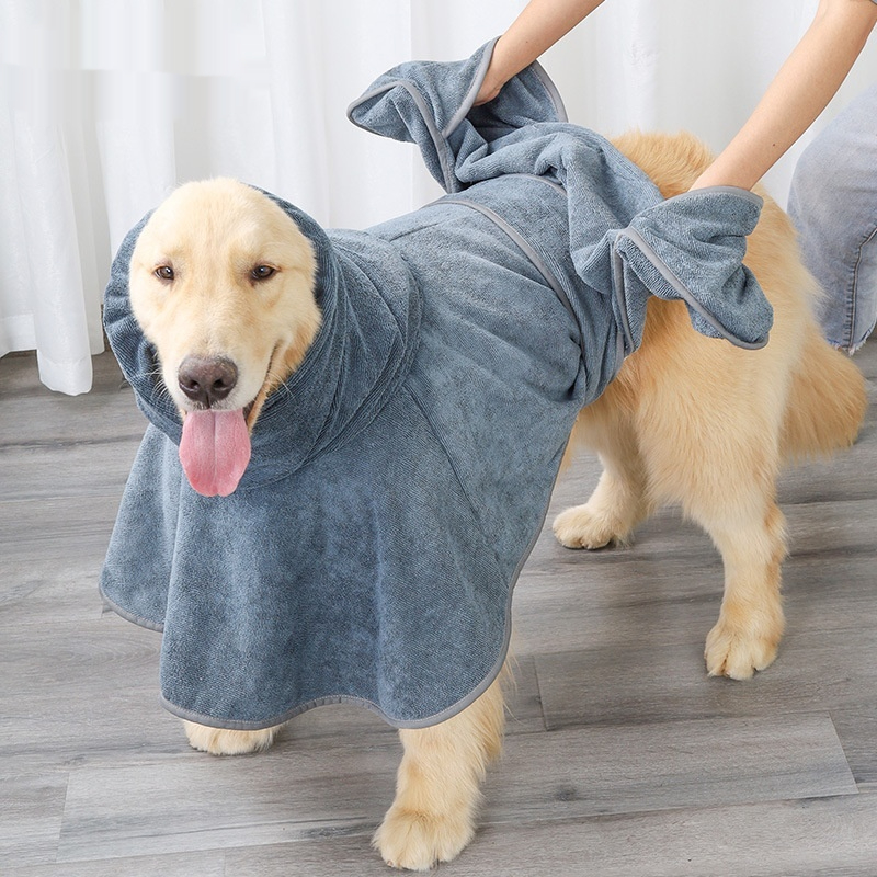 Dog wearing the grey towel-cloth drying wrap